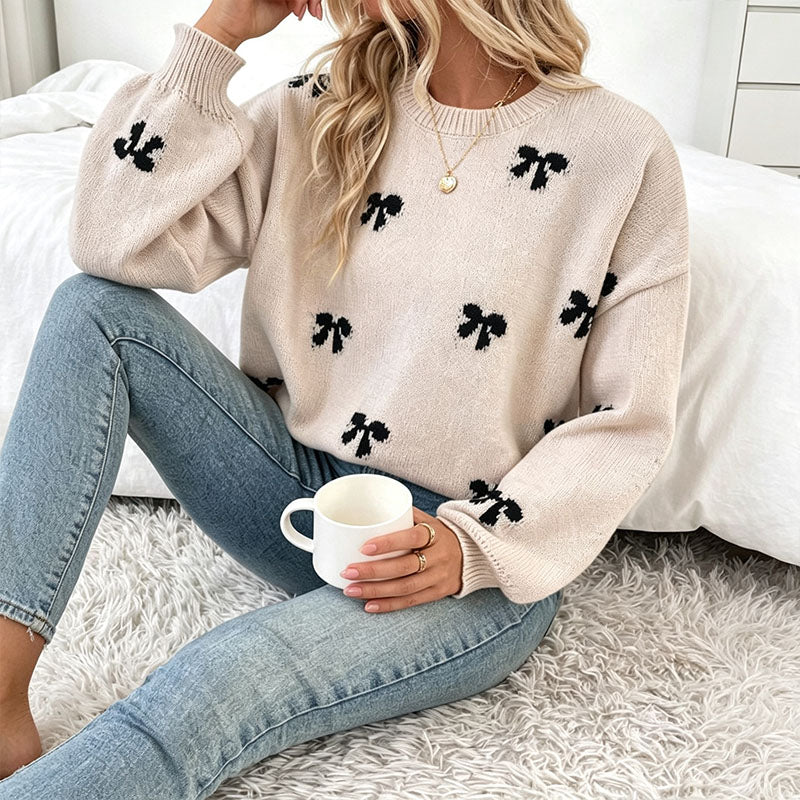 Bow-patterned knit sweater