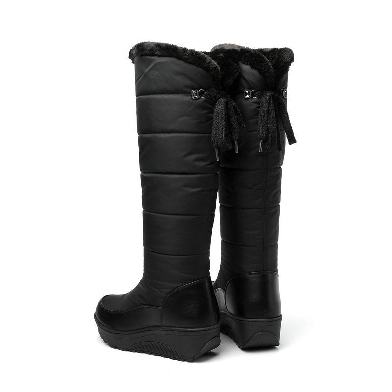 Thick-soled, warm, over-the-knee snow boots