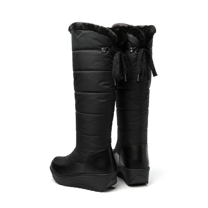 Thick-soled, warm, over-the-knee snow boots