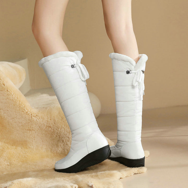 Thick-soled, warm, over-the-knee snow boots