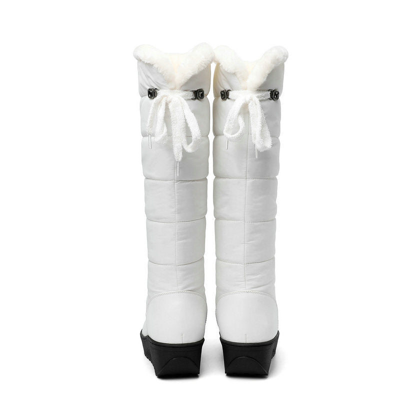 Thick-soled, warm, over-the-knee snow boots
