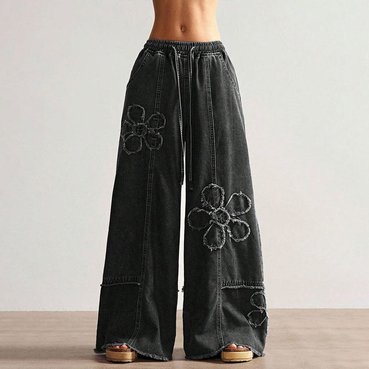 Elastic waist floral frayed wide-leg jeans