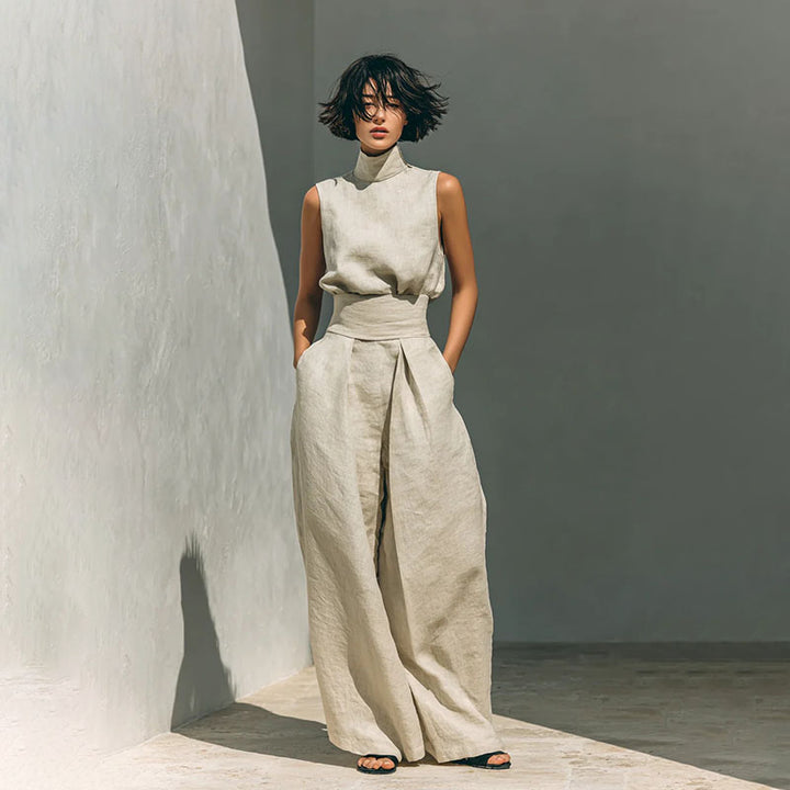Sleeveless high-neck top and high-waisted pleated wide-leg trousers set