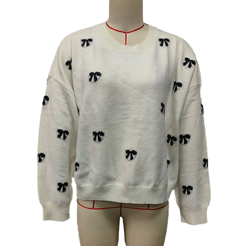 Bow-patterned knit sweater