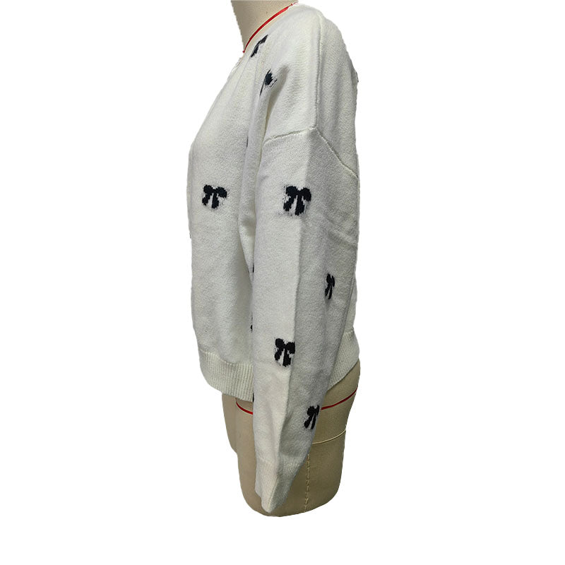 Bow-patterned knit sweater