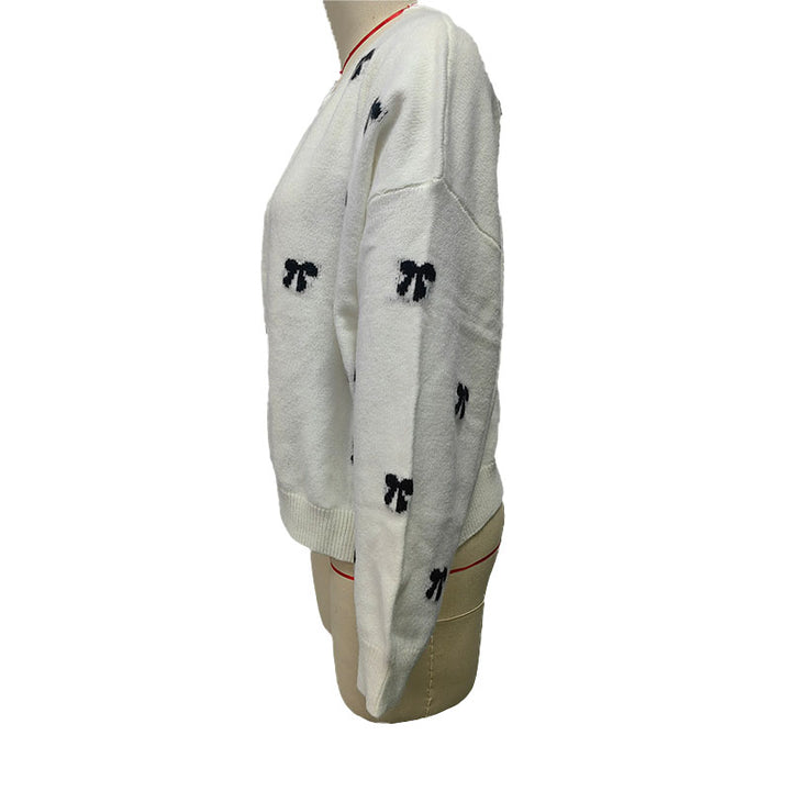Bow-patterned knit sweater