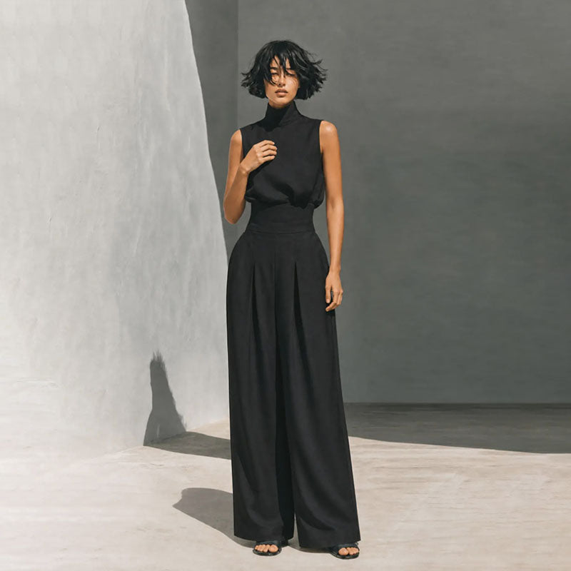 Sleeveless high-neck top and high-waisted pleated wide-leg trousers set