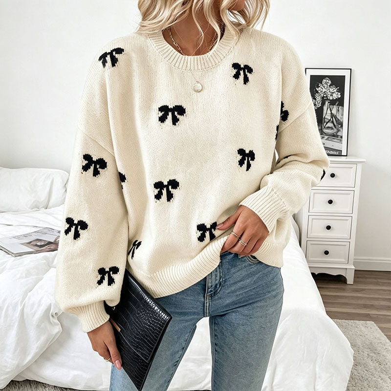 Bow-patterned knit sweater