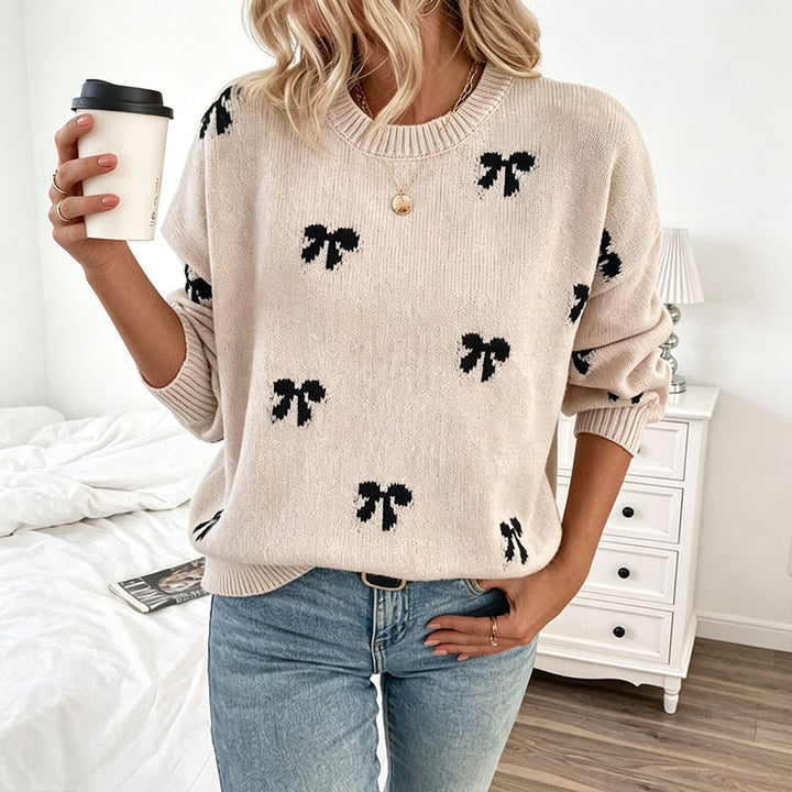 Bow-patterned knit sweater