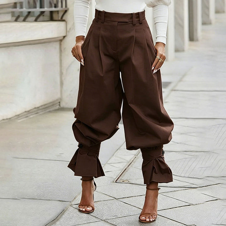 High-waisted loose-fit ruffled trousers